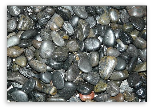 Small black river stones